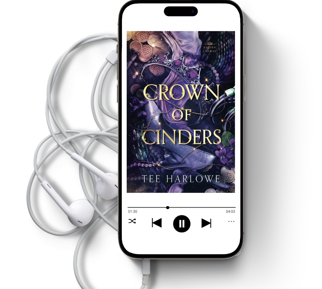 Phone displaying 'Crown of Cinders' by Tee Harlowe with earphones on a white background
