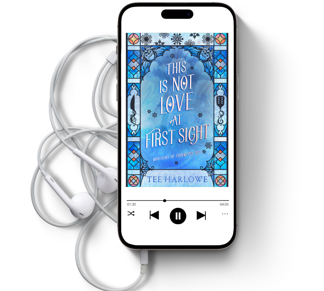 Phone displaying a book cover with text and earbuds on a white background