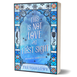Book cover with decorative blue and white design and text 'This is Not Love at First Sight' by Tee Harlowe.